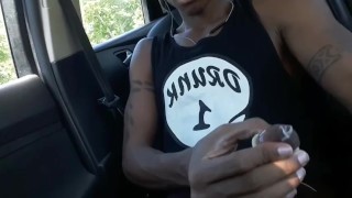 Outdoor car condom display. Putting on a condom