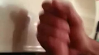 Amateur Latino stroking uncut cock for dripping cumshot in bathroom