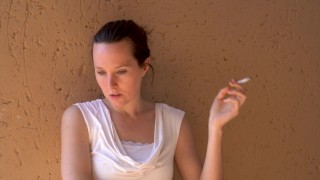 Lady Enjoying a Cigarette