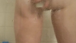 Washing her tight pussy and ass
