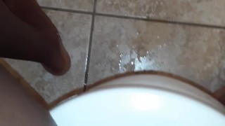 PISSING ON THE TOILET SEAT AND FLOOR