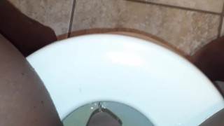 PISSING ON THE TOILET SEAT AND FLOOR