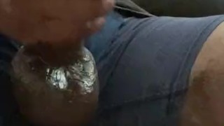Black guy jerking thick dick oozing precum and cumload