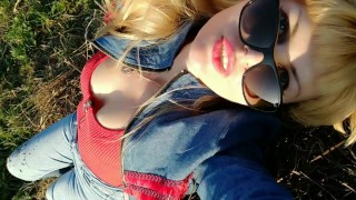 A sunny day & a gorgeous milf sunbathing in the field feeling sexy! 