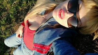 A sunny day & a gorgeous milf sunbathing in the field feeling sexy! 