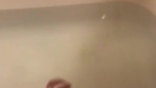 Stroking my soft cock in the bathtub with soap 