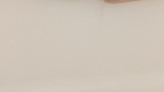 Horny pregnant milf pissing in the shower 