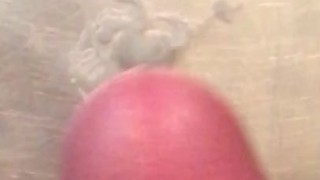 Jacking off and cumming in the shower