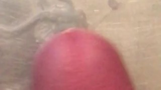Jacking off and cumming in the shower