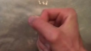 Jacking off and cumming in the shower