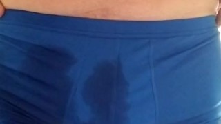 Pee desperation in blue underwear.