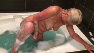 Hot Milf putting on a show in a hot tub 