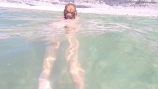 Naked girl on the beach. Naked girl on the beach masturbates.