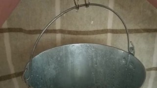 BDSM Pussy Labia Stretching Weight Torture Pissing in a Bucket Clamped Lips