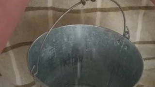 BDSM Pussy Labia Stretching Weight Torture Pissing in a Bucket Clamped Lips