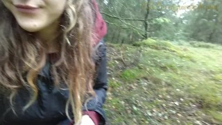 She's pissing in the forest