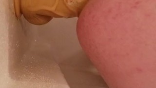 Taking a huge thick dildo up my ass