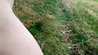 Naked in a field