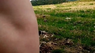 Naked in a field