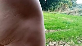 Naked in a field