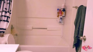 chubby redhead scrubs filthy bathroom with rubber gloves