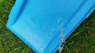 Barefoot Babysitter Takes Quick Piss On Slide