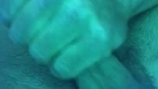 Fit man jerks off in tanning bed