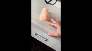 Twink licks own cum from fake pussy