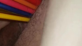 Pussy stuffed with paintbrushes