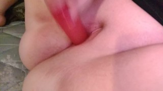 Rubbing clit and fucking big ribbed dildo