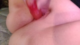 Rubbing clit and fucking big ribbed dildo
