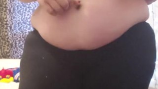 Chubby girl plays with jiggly belly