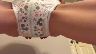 Diaper girl soaks baby diaper until it leaks everywhere 