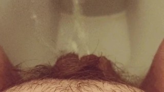 Close-up hairy pussy pissing on public toilet after holding 