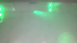 Underwater jerk off session in backyard in steamy hot tub glowing at night.