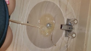 Girl Stands To Pee In Sink Like A Boy