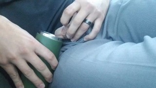 Desperate parking lot piss into thermos