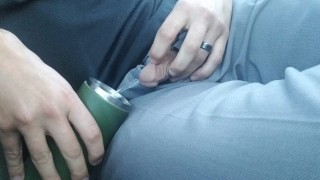 Desperate parking lot piss into thermos