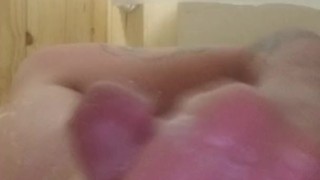 Man masturbates and cums in shower