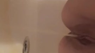 Callie Queen - Callie squats - First piss in tub clip
