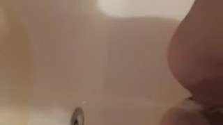 Callie Queen - Callie squats - First piss in tub clip