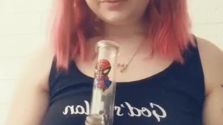 Cute teen takes a huge rip from her bong