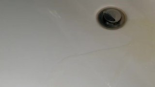 Slow piss in the sink