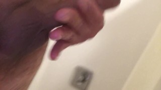 My dick half hard in the shower...