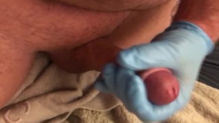Closeup latex gloves silicone lube MASTURBATION