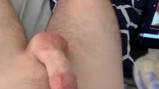 Twink teases himself while watching porn