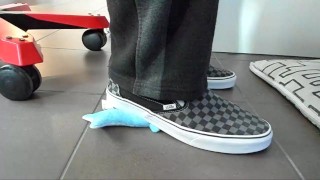 Male shoeplay and stomping stuff at home in Nikes, Vans, blue stiped socks