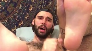 Playing with my feet while showing off my hairy hole