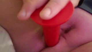 Teen plays with toys