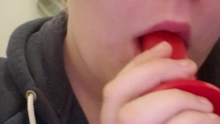 Teen sucks dildo